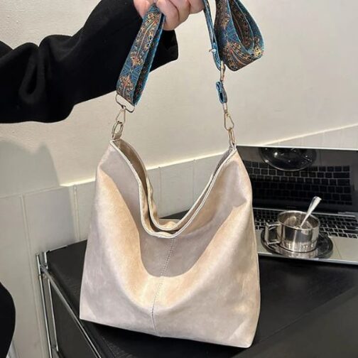 Bolsa Vintage com alça ajustável e zíper de fechamento