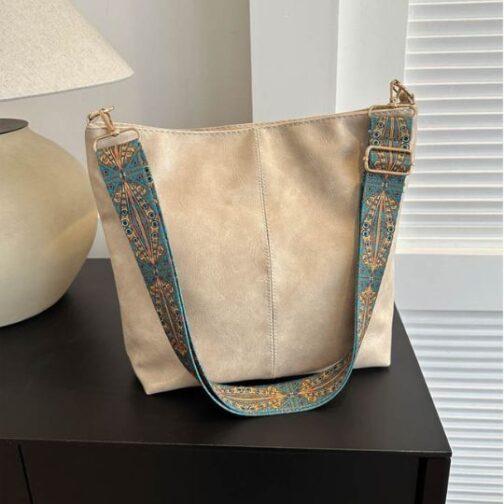 Bolsa Vintage com alça ajustável e zíper de fechamento